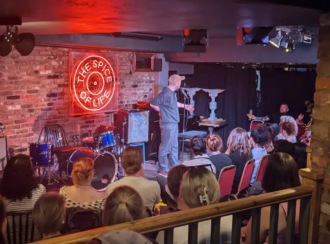 Comedians performing stand-up at JK Comedy Club London