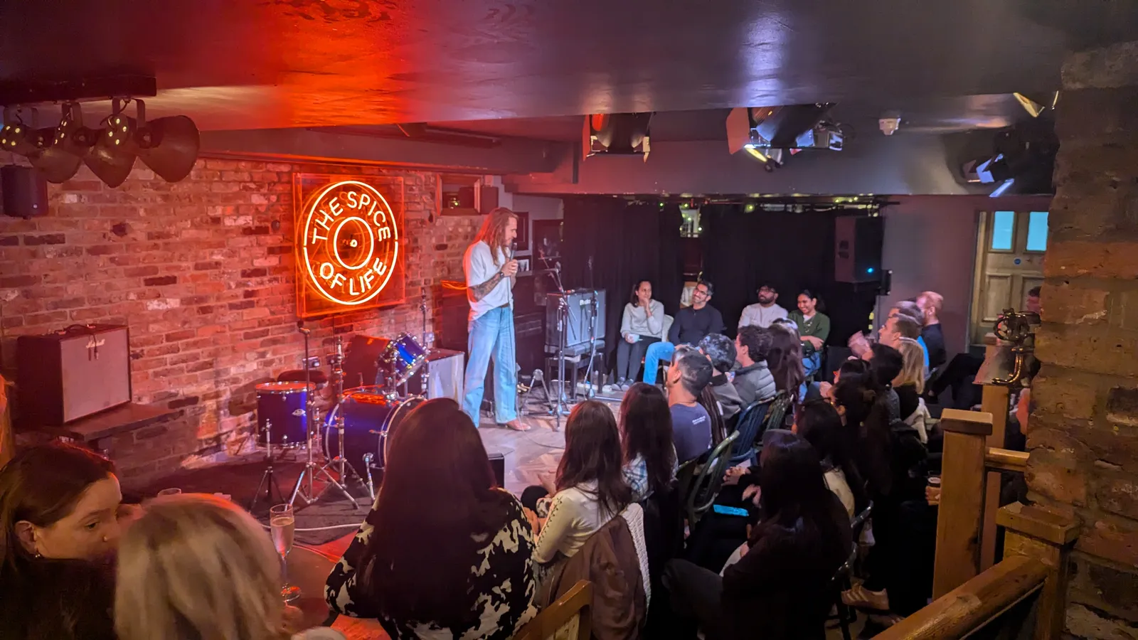 Comedian performing at JK Comedy Club