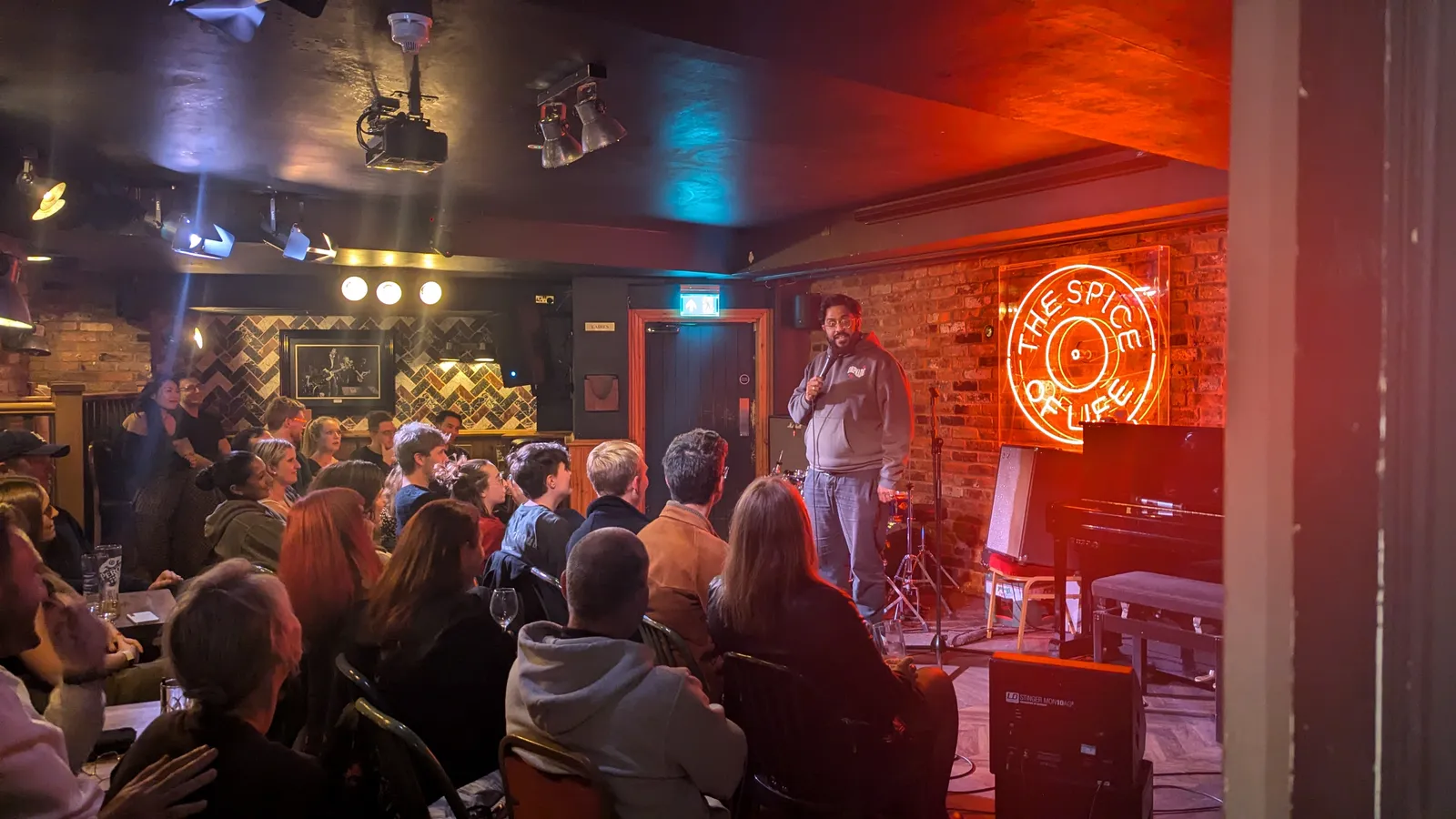 Packed audience enjoying cheap comedy in London